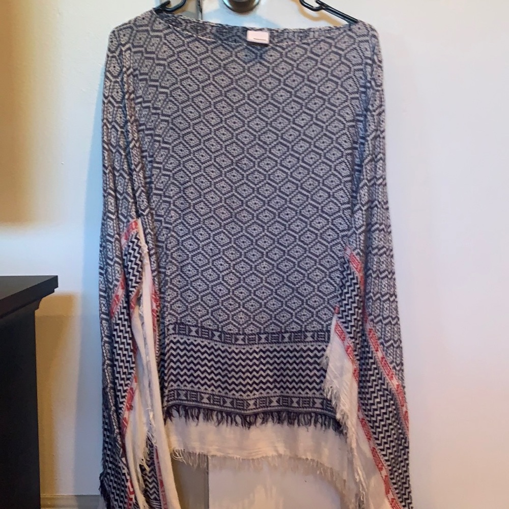 Flowy tribal printed top fringed edges blue white and red designs